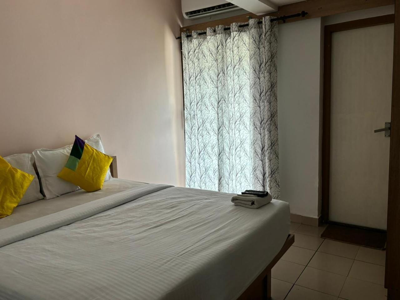 Abrigo Delamar Kozhikode Buitenkant foto