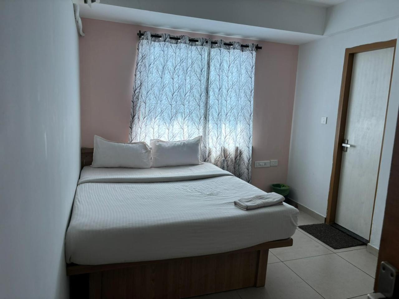 Abrigo Delamar Kozhikode Buitenkant foto